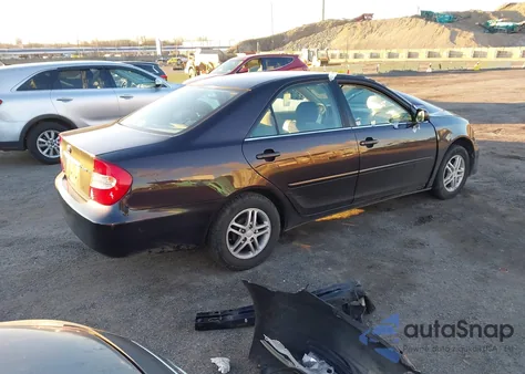 2002 Toyota Camry Le from USA, damaged, VIN 4T1BE32K22U588260